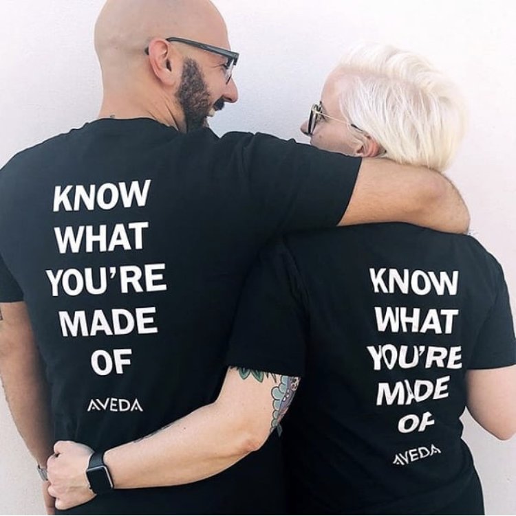 Image of 2 staff hugging